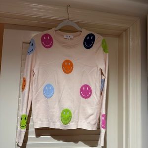 Smiley face sweater